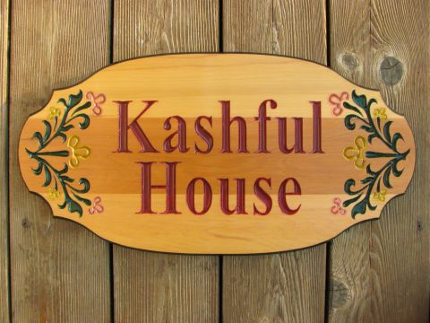 Wooden sign house family name